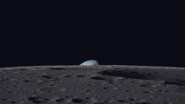 The top edge of the Earth just appears above the horizon.